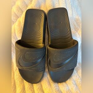 Nike men’s air max slides.  Size 10.